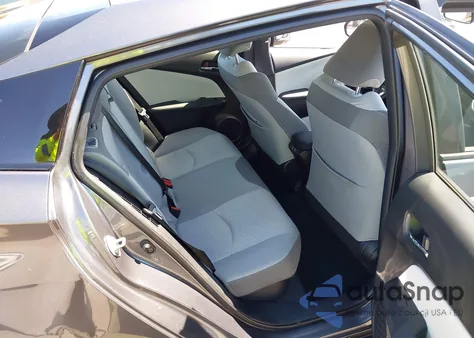 2022 Toyota Prius Prime Le z USA, uszkodzony, nr VIN JTDKAMFP3N3218022